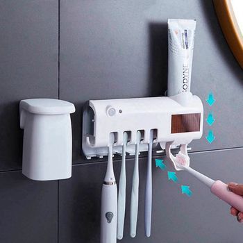 Dozirnik zobne paste in držalo za ščetko